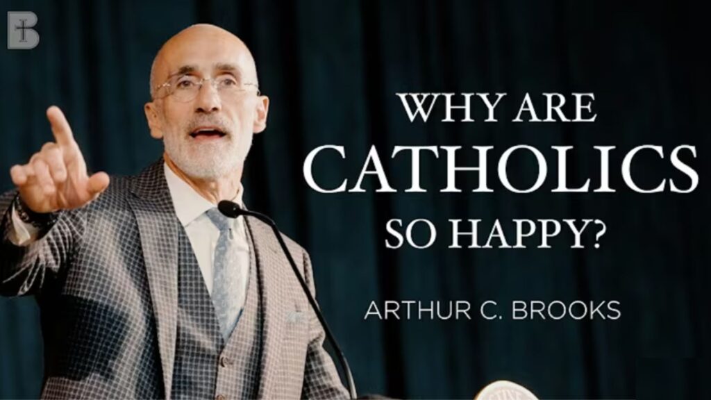 Arthur C. Brooks stands at podium speaking